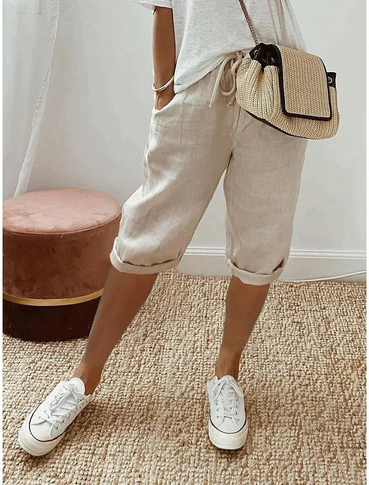 Comfortable women's polyester capri pants, perfect for summer. Lightweight, casual, and chic elastic waist bottoms.