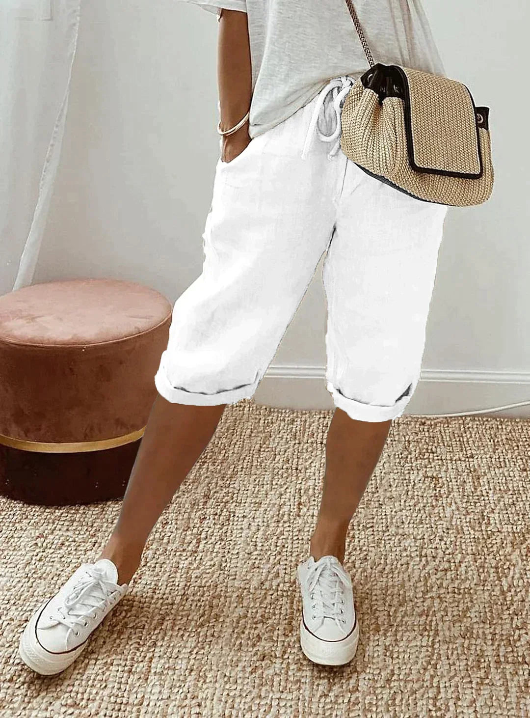 Lightweight women's polyester capri pants with an elastic waist for ultimate comfort. Stylish casual summer bottoms.
