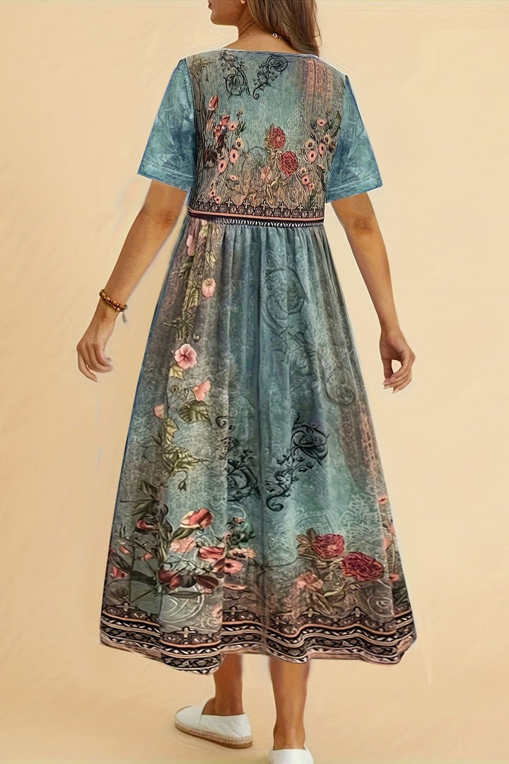 Elegant printed midi dress for women, offering effortless style and a comfortable relaxed fit for any day.