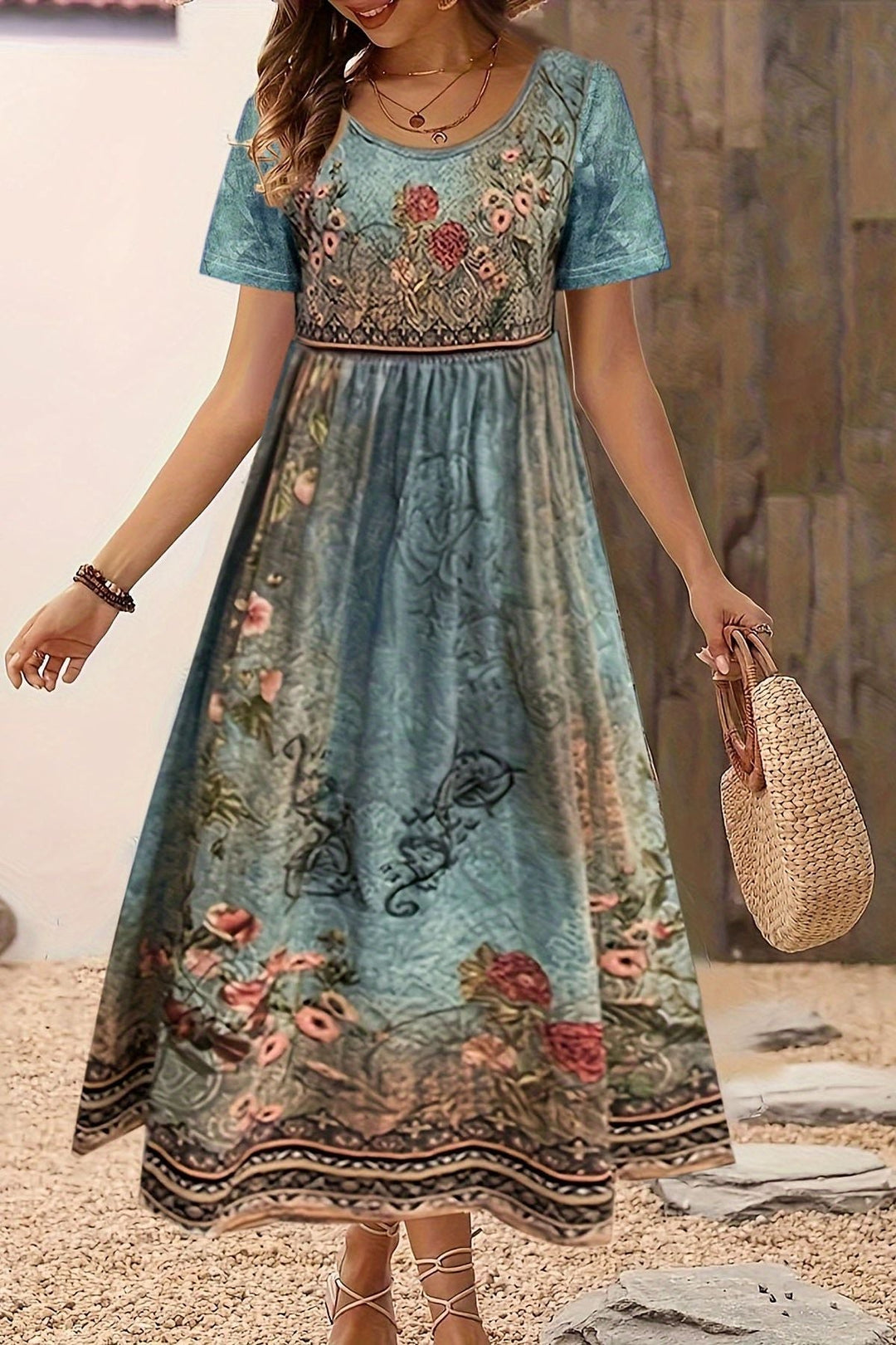 Chic women's printed midi dress for spring/summer, comfortable, versatile, and knee-length for effortless style.