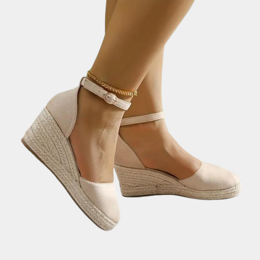 Comfortable women's wedge sandals with adjustable ankle strap, perfect for versatile summer and casual wear.