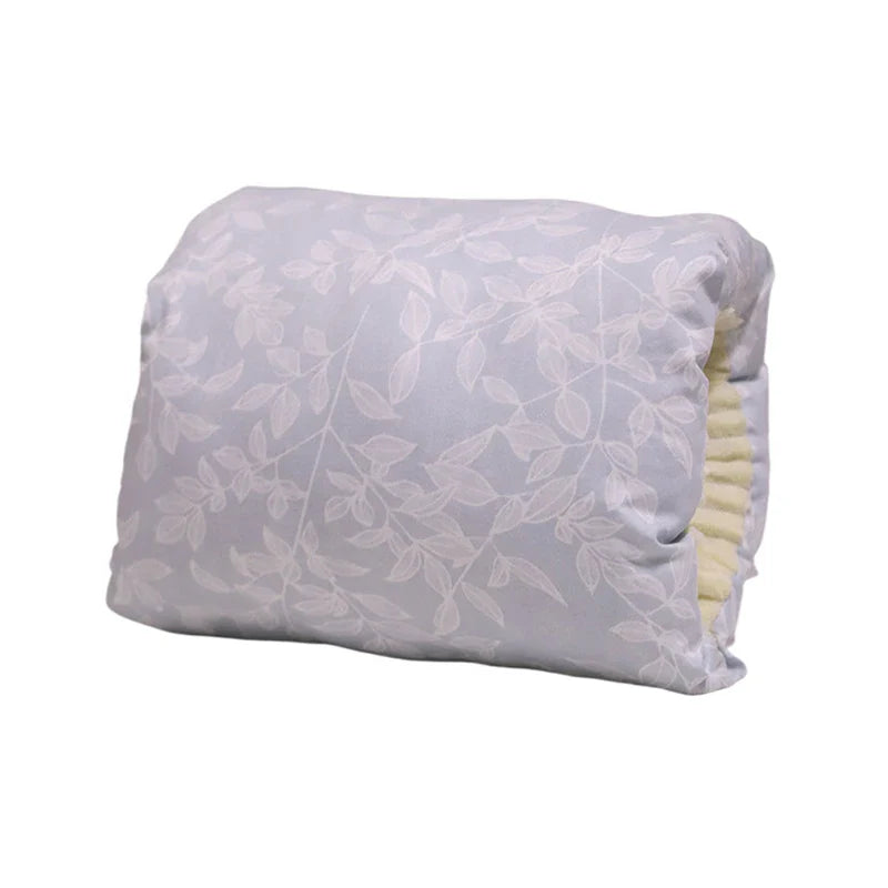 Overhead shot of the Comfy Cradle Arm Pillow, showcasing its ergonomic shape for feeding.