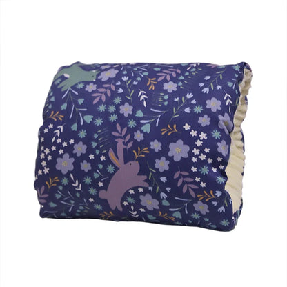Fabric texture of the Comfy Cradle Nursing Pillow, emphasizing its soft and gentle feel for baby.