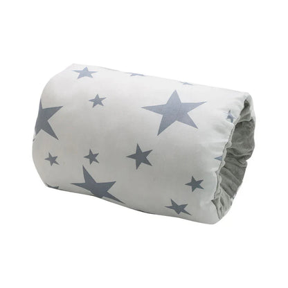 Mother gently holding baby using the Comfy Cradle Nursing Arm Pillow for comfortable feeding.