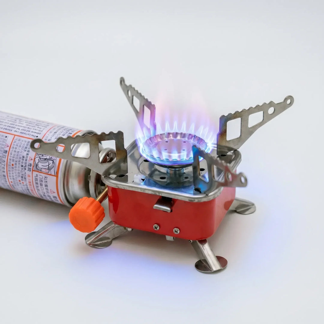 Durable folding camping stove for easy outdoor cooking. Portable design makes it ideal for travel and camp kitchens.