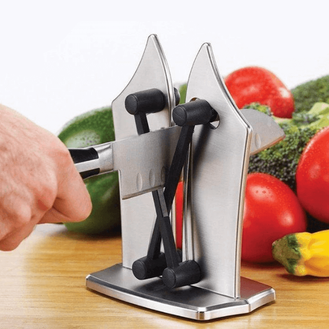 Compact kitchen knife sharpener with tungsten carbide for effortless blade care and improved cutting performance.