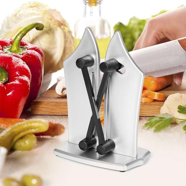 Close-up of a modern kitchen knife sharpener, showcasing its sleek design and high-quality sharpening slots.