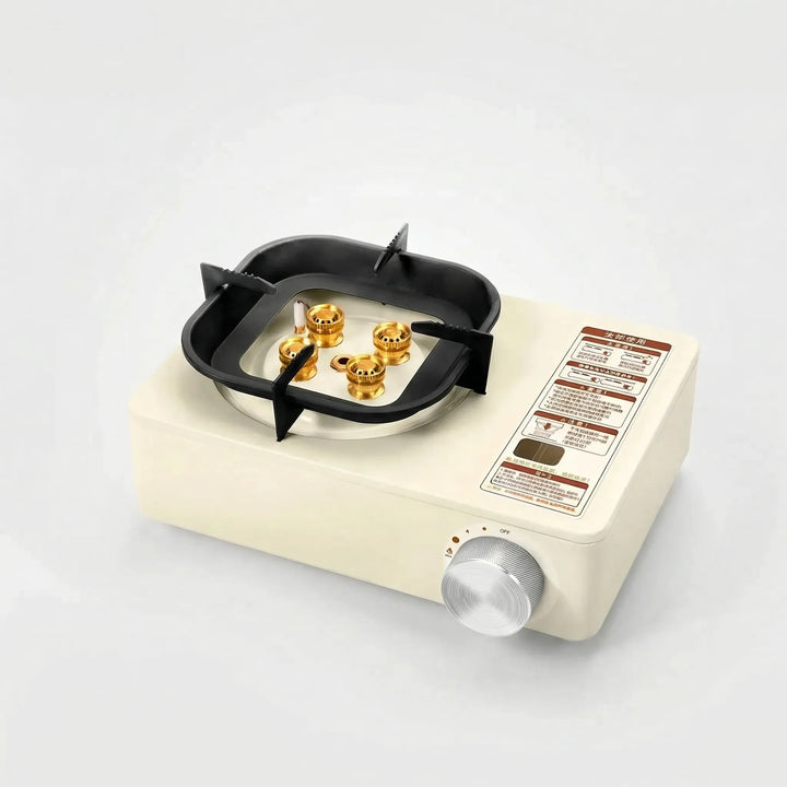 Outdoor cooking with a compact butane gas stove. Perfect for campers and backpackers needing a reliable single burner.