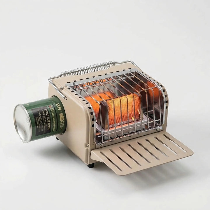 Red portable cassette gas heater, ideal tabletop camping gear for chilly outdoor fishing and winter trips.