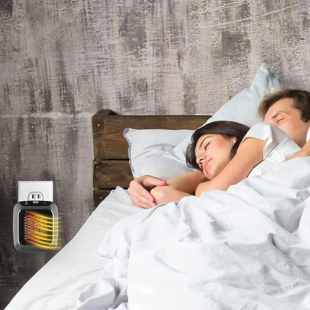 Grey compact electric room heater, featuring remote control for convenient & cozy home heating.