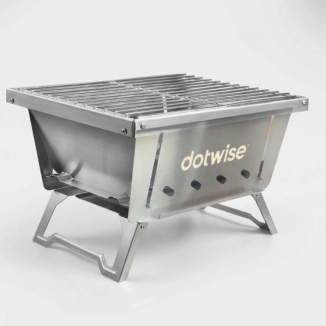 Folding outdoor BBQ grill, perfect for travel & camping. Compact design for charcoal and firewood cooking.