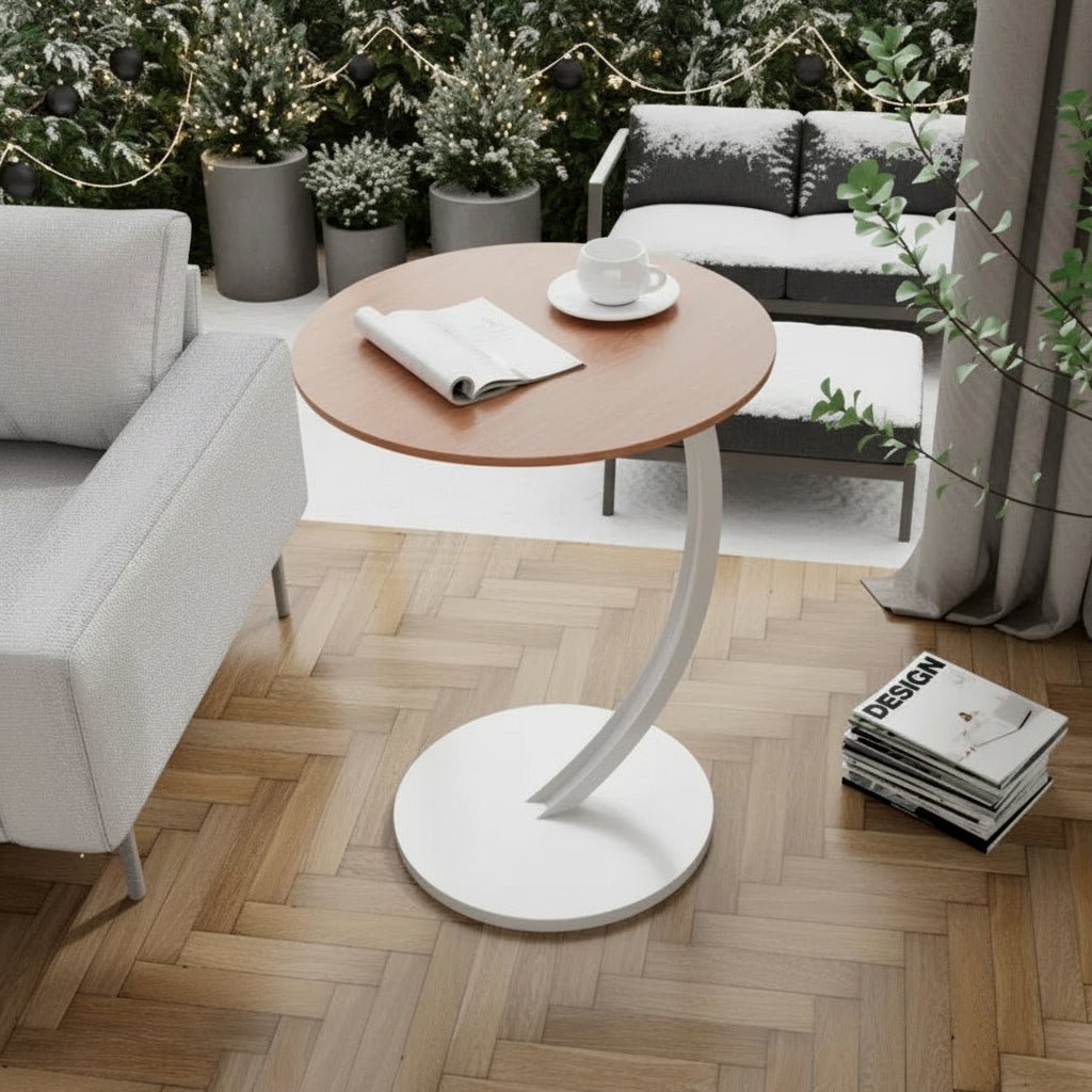 Modern round accent table, space-saving furniture for small areas.