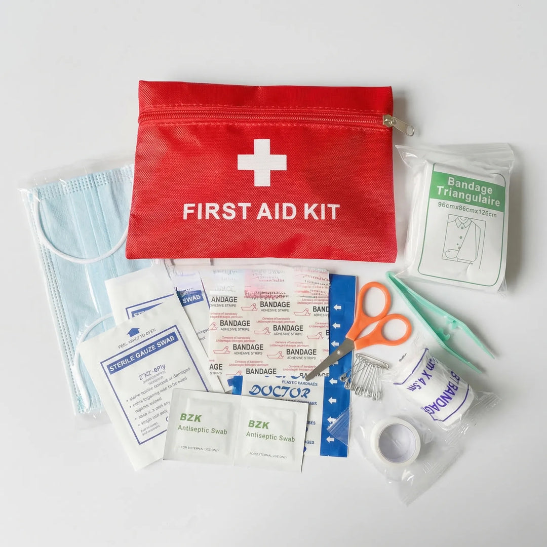 Unisex compact first aid kit bag for emergency preparedness, hiking, camping, and travel. Portable medical essential.