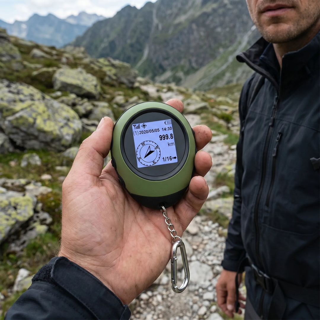 Person holding a compact handheld satellite GPS navigator for hiking & outdoor travel. Essential adventure gear.