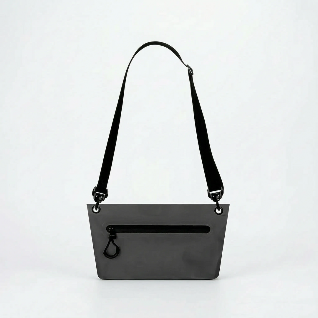 Compact outdoor dry bag in vibrant blue, perfect for beach days, hiking, and keeping essentials dry.