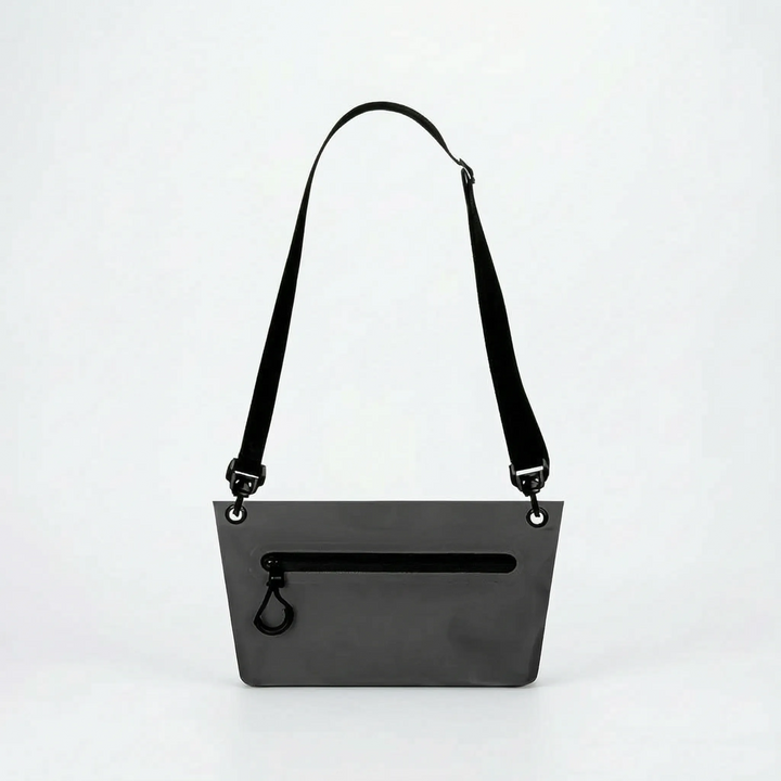 Compact outdoor dry bag in vibrant blue, perfect for beach days, hiking, and keeping essentials dry.