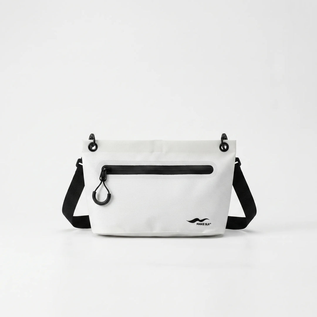 Durable, waterproof dry bag with adjustable shoulder strap. Ideal for kayaking, beach trips, and river rafting.