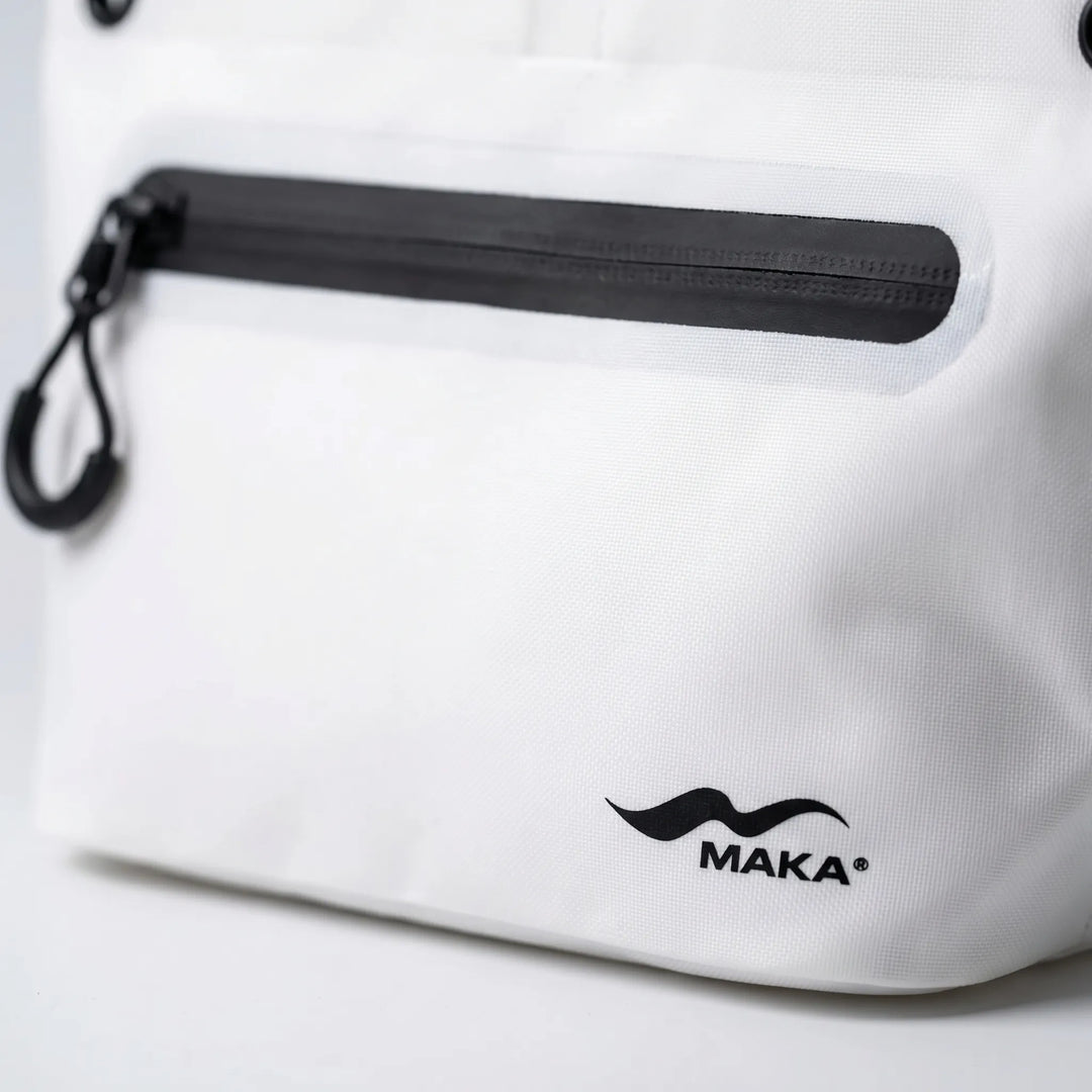 Small portable dry bag keeping gear safe and dry. Perfect for travel, camping, hiking, and water activities.