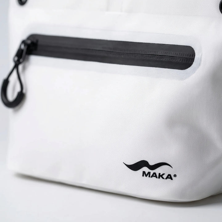 Small portable dry bag keeping gear safe and dry. Perfect for travel, camping, hiking, and water activities.