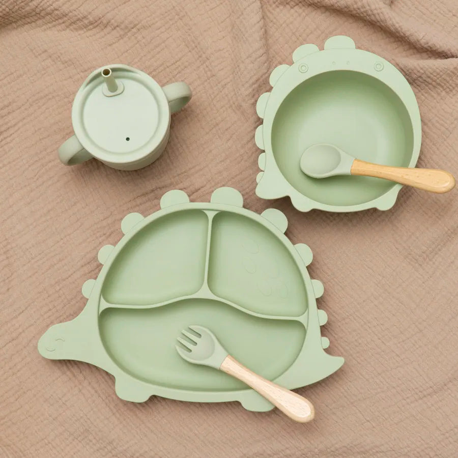 BPA-Free silicone baby feeding set displayed on a high chair tray, showing its secure fit.