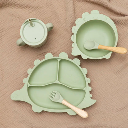 BPA-Free silicone baby feeding set displayed on a high chair tray, showing its secure fit.