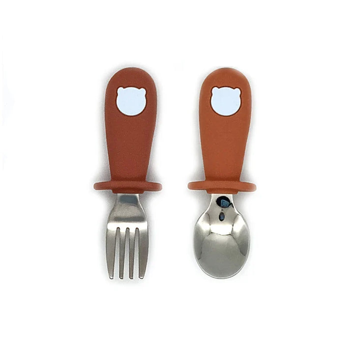 Practical kids feeding set: suction silicone plate & bowl, gentle silicone spoon, and child-friendly steel fork.