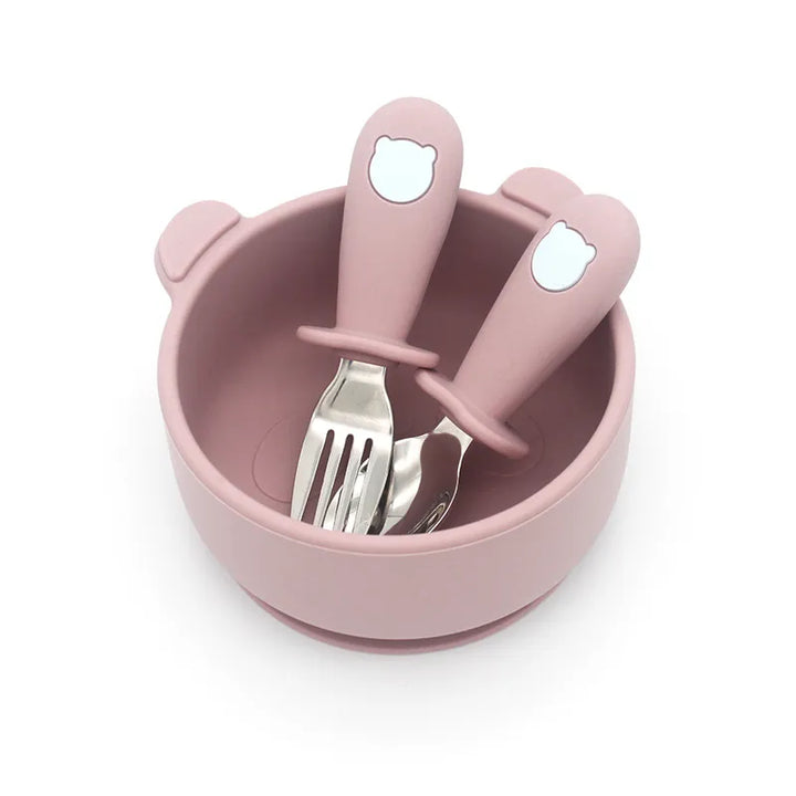 Essential mealtime solutions for babies: silicone tableware set with spoon and stainless steel fork.