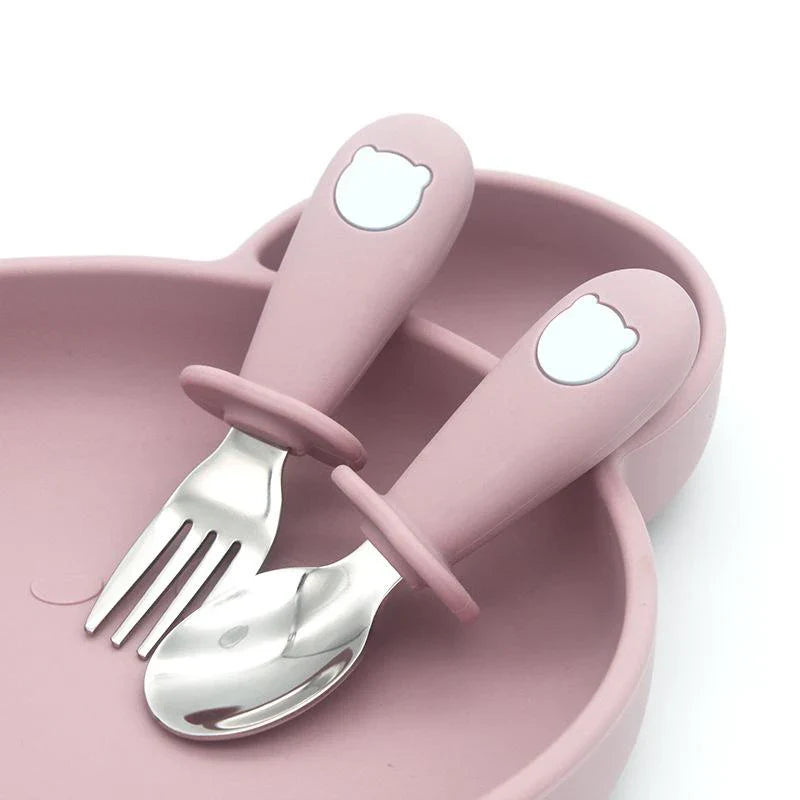 Green silicone baby feeding set: suction bowl, divided plate, soft silicone spoon & toddler-safe stainless steel fork.