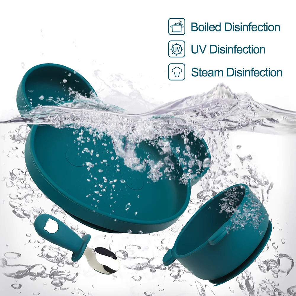 Toddler cutlery set with ergonomic silicone handle spoon and child-safe stainless steel fork for self-feeding.