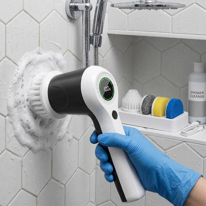 Rechargeable electric spin scrubber tackling tough kitchen grease and grime. Multi-surface cleaning tool for home.