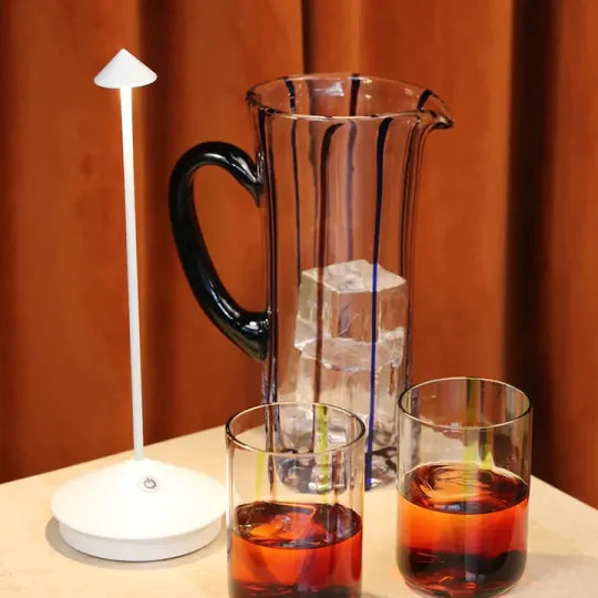 Energy-efficient LED accent lamp, rechargeable and cordless for sustainable home lighting.