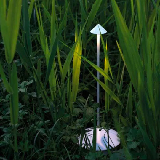 Compact cordless rechargeable LED lamp, ideal for small spaces and portable accent lighting.