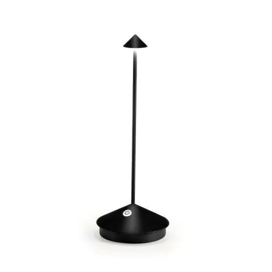 Minimalist modern cordless LED lamp, rechargeable for chic portable accent lighting.