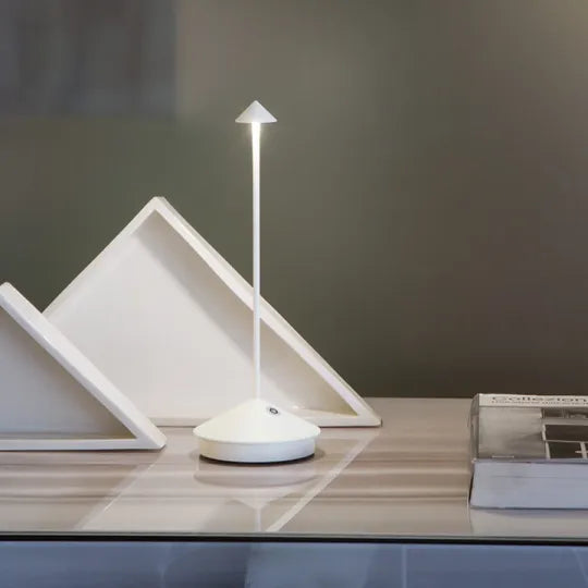 Stylish cordless LED table lamp for indoor accent lighting & modern home decor, rechargeable.