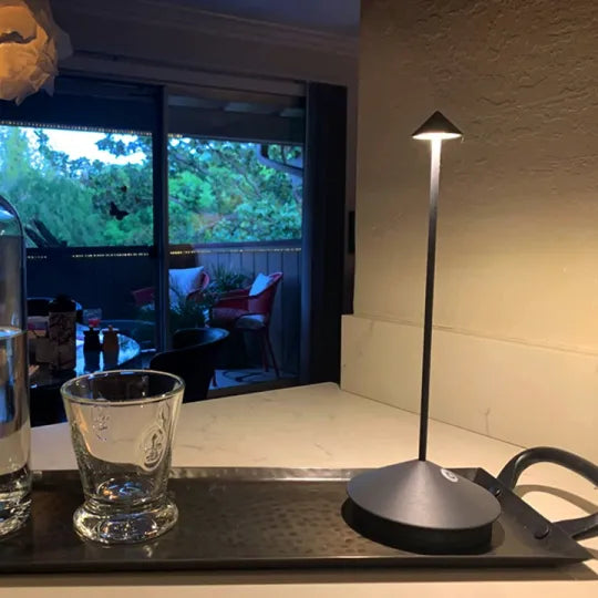 Sleek modern cordless LED lamp, a portable and rechargeable accent light for any room.