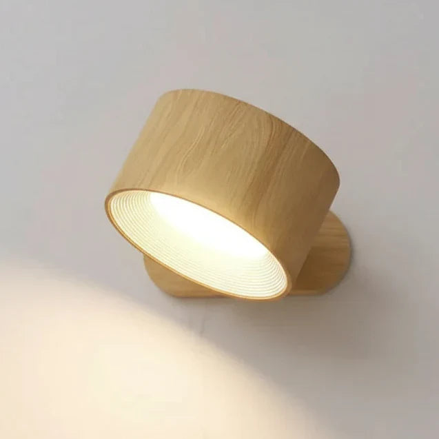 Cordless rotatable LED wall lamp, modern design for versatile task and ambient lighting in any room.