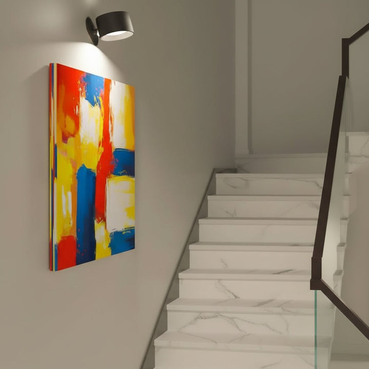 Magnetic rechargeable LED wall light, easily detaches and rotates for flexible, wireless illumination.