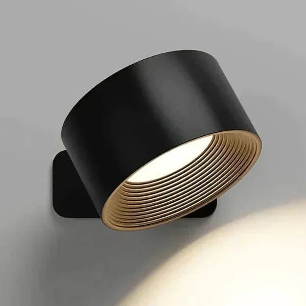 Adjustable cordless LED wall light, modern and rechargeable, perfect for flexible task and ambient lighting.