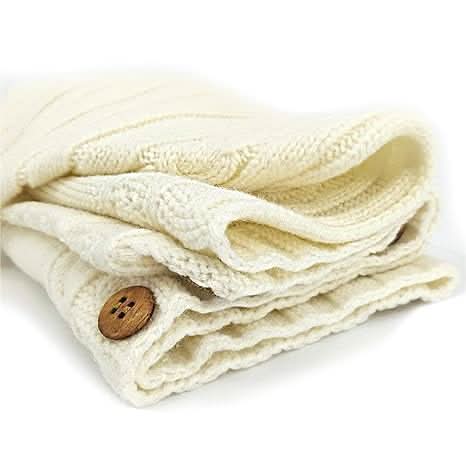 Soft knit beige infant wrap swaddle. Cozy acrylic baby blanket for newborns, 0-6 months.