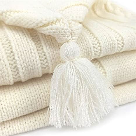 Newborn beige soft knit swaddle wrap. Cozy acrylic baby blanket for infants 0-6 months.