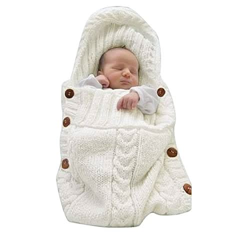 Hooded beige soft knit baby swaddle wrap. Cozy infant blanket, ideal for newborn travel 0-6 months.