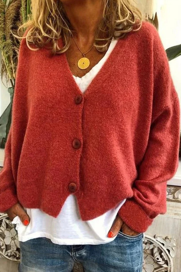 Casual long sleeve women's cardigan with front buttons, offering everyday comfort.