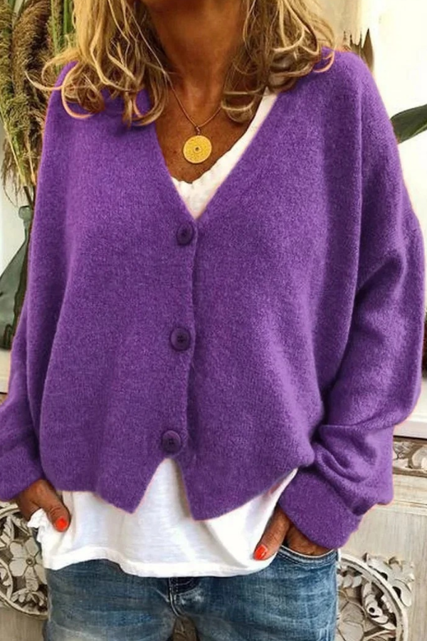 Women's cozy button-front cardigan in neutral tone, a versatile everyday essential.