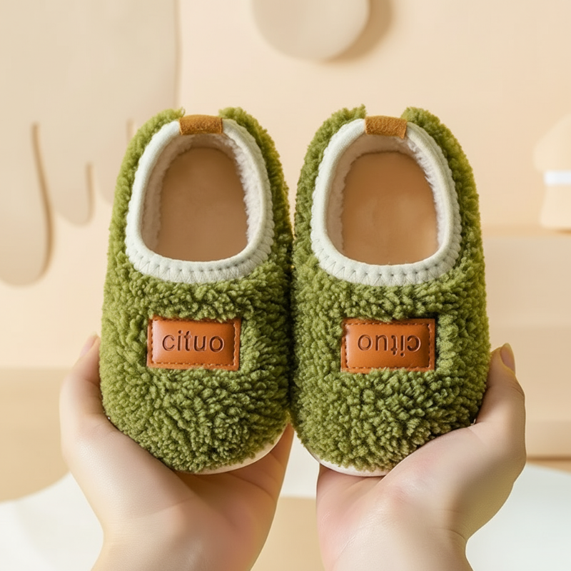 Toddler's warm anti-slip slippers, soft and safe winter indoor footwear.