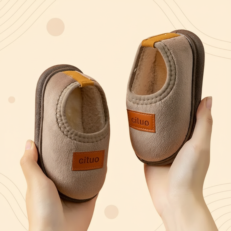 Warm anti-slip indoor shoes for toddlers, ensuring a snug and secure fit.