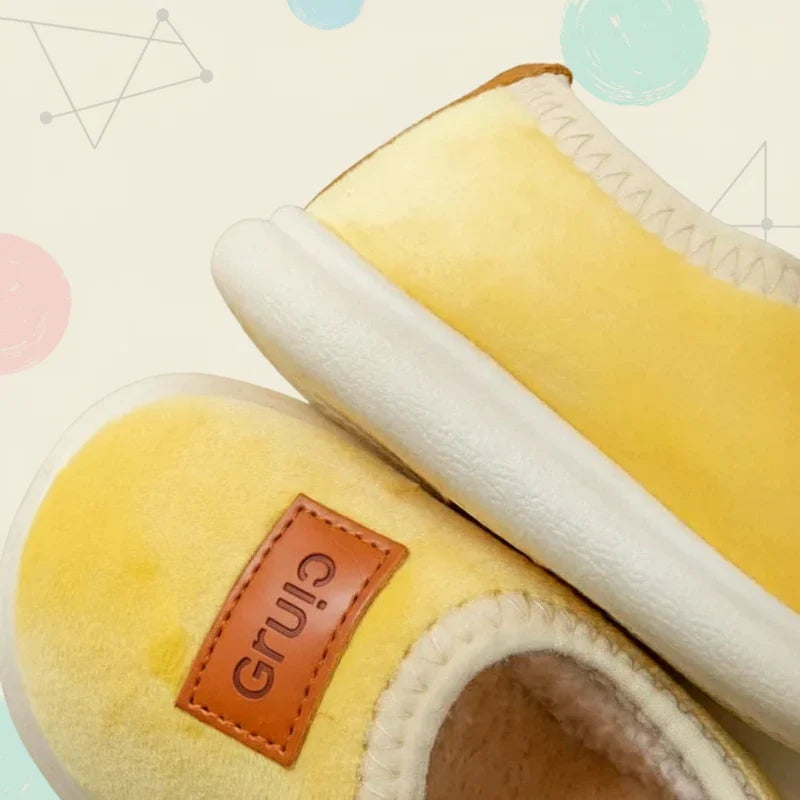 Warm suede baby booties, ideal indoor shoes with non-slip grip for kids.