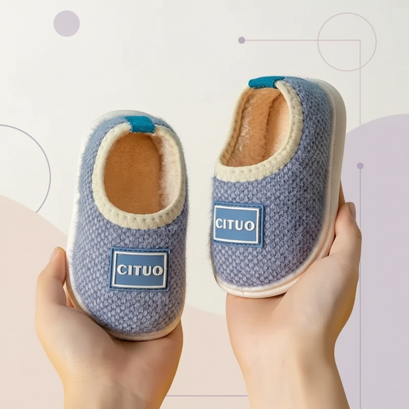 Kids' cozy winter house slippers with durable anti-slip rubber outsoles.