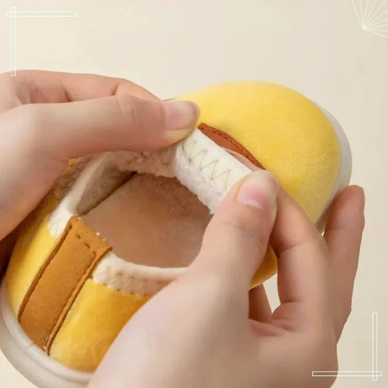 Soft toddler footwear, warm winter house slippers with durable anti-slip soles.