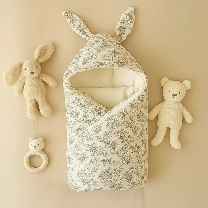 Baby swaddle blanket featuring an adjustable closure for a perfect, secure fit for infants.