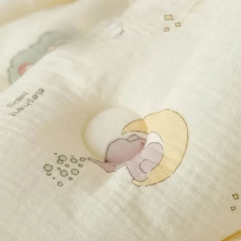 A baby wrapped in a pink cozy swaddle blanket, showcasing its secure and comforting design.